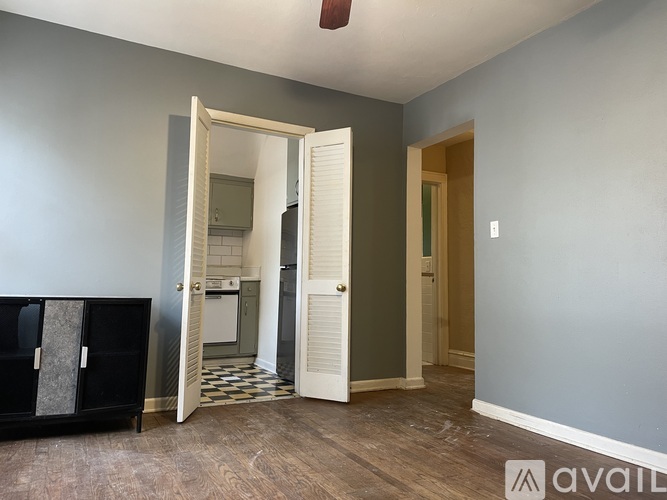 A room with a washer and dryer in it.