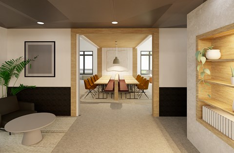 A modern living room with a dining area in the middle.