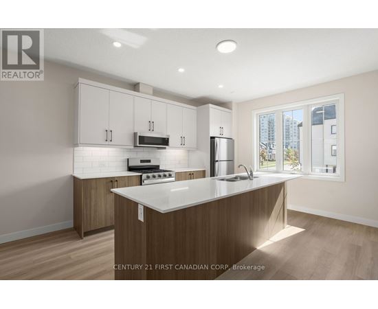 A kitchen with wooden cabinets and a white counter top.