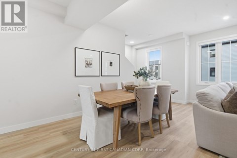 A kitchen with wooden cabinets and a white counter top.