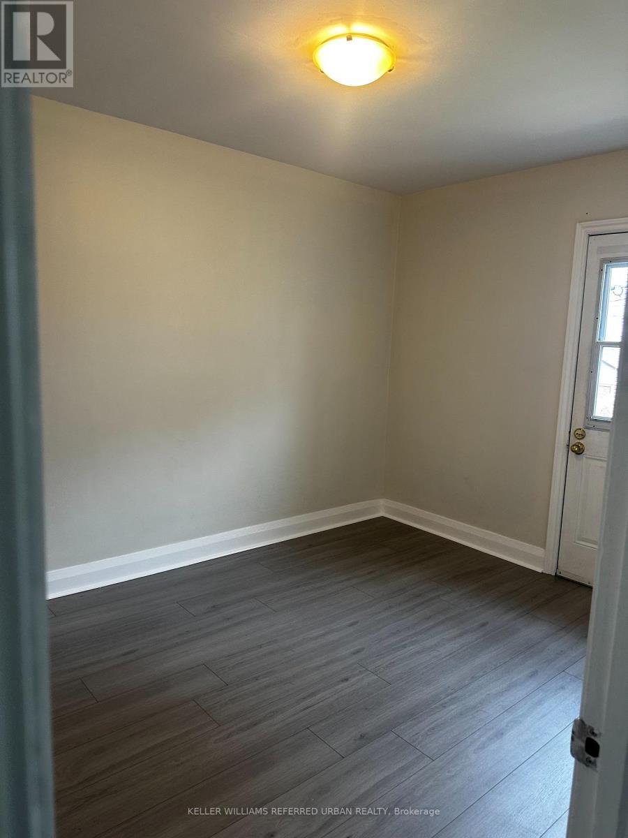 A room with a door and a window.