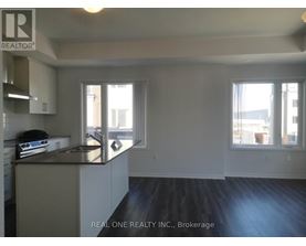 A kitchen with a sink and a window.
