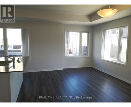 A room with a window and a sink.