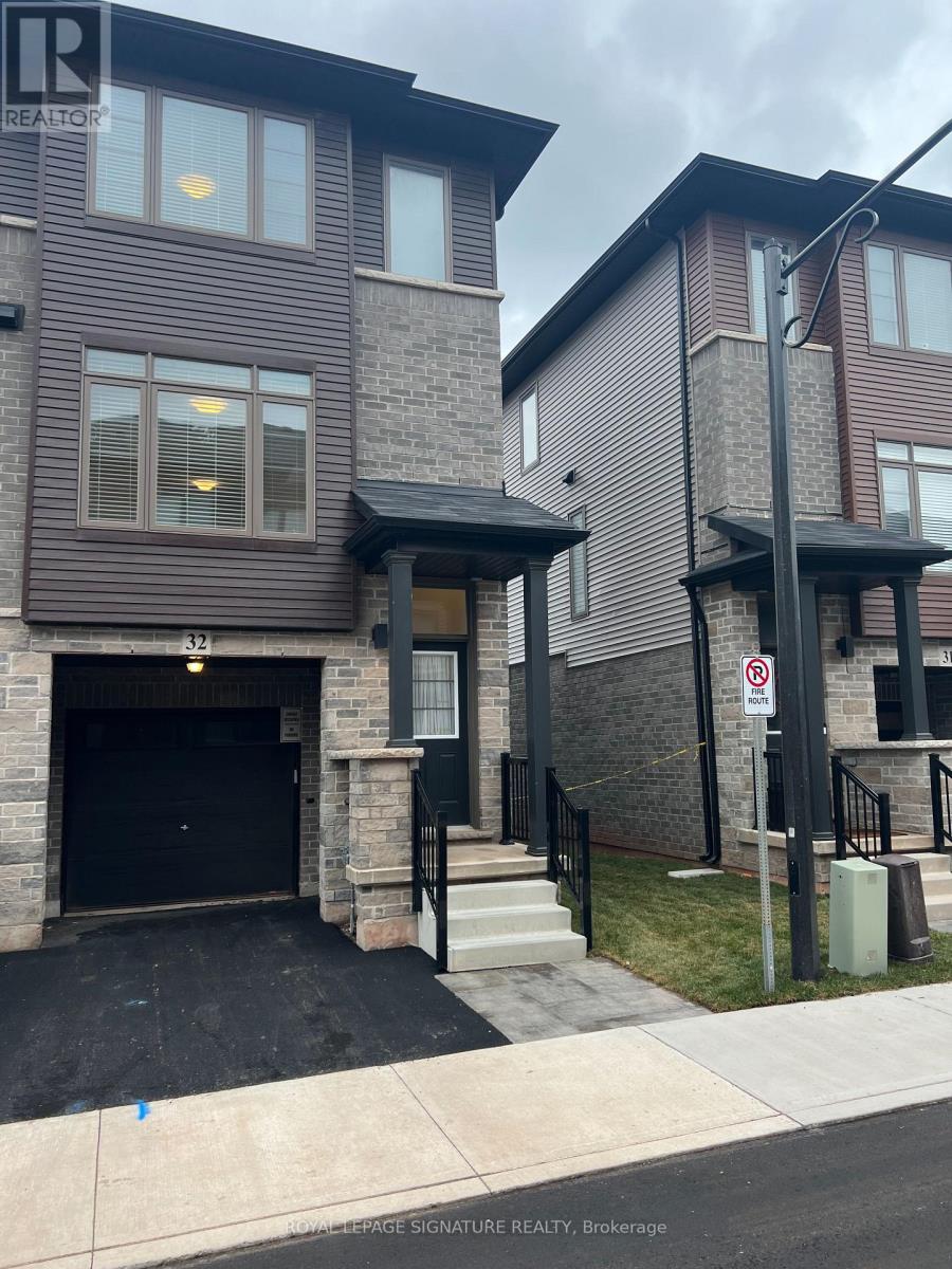 A modern two-story house with a garage and a no parking sign.
