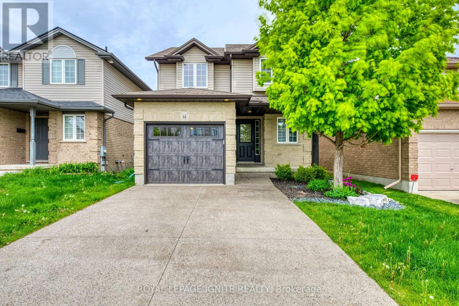 A house with a driveway in front of it.