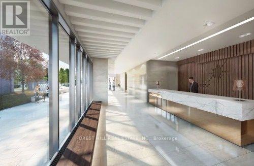 A modern office lobby with a marble reception desk and a long wooden bench.