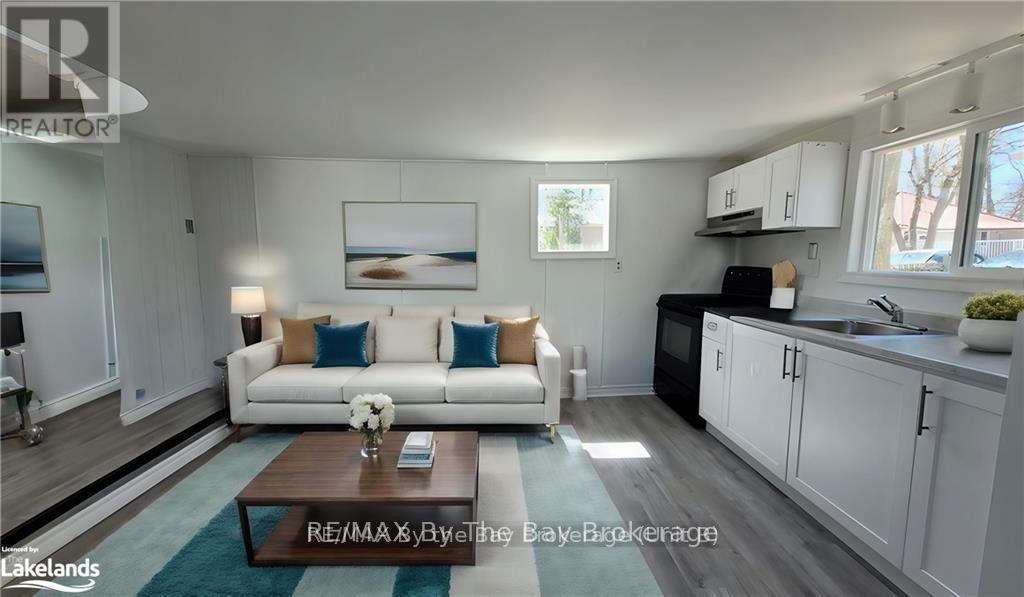 A modern living room with a white couch and a coffee table.