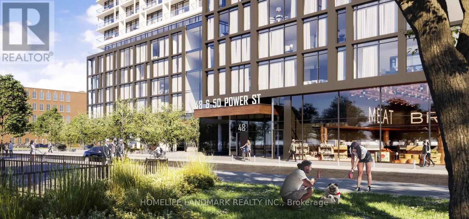 A rendering of a modern building with a glass facade and a sign that reads "S 5th Power St." in front of it.