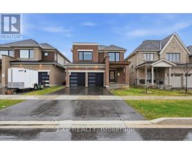 A real estate photo of a house with a truck parked in front.