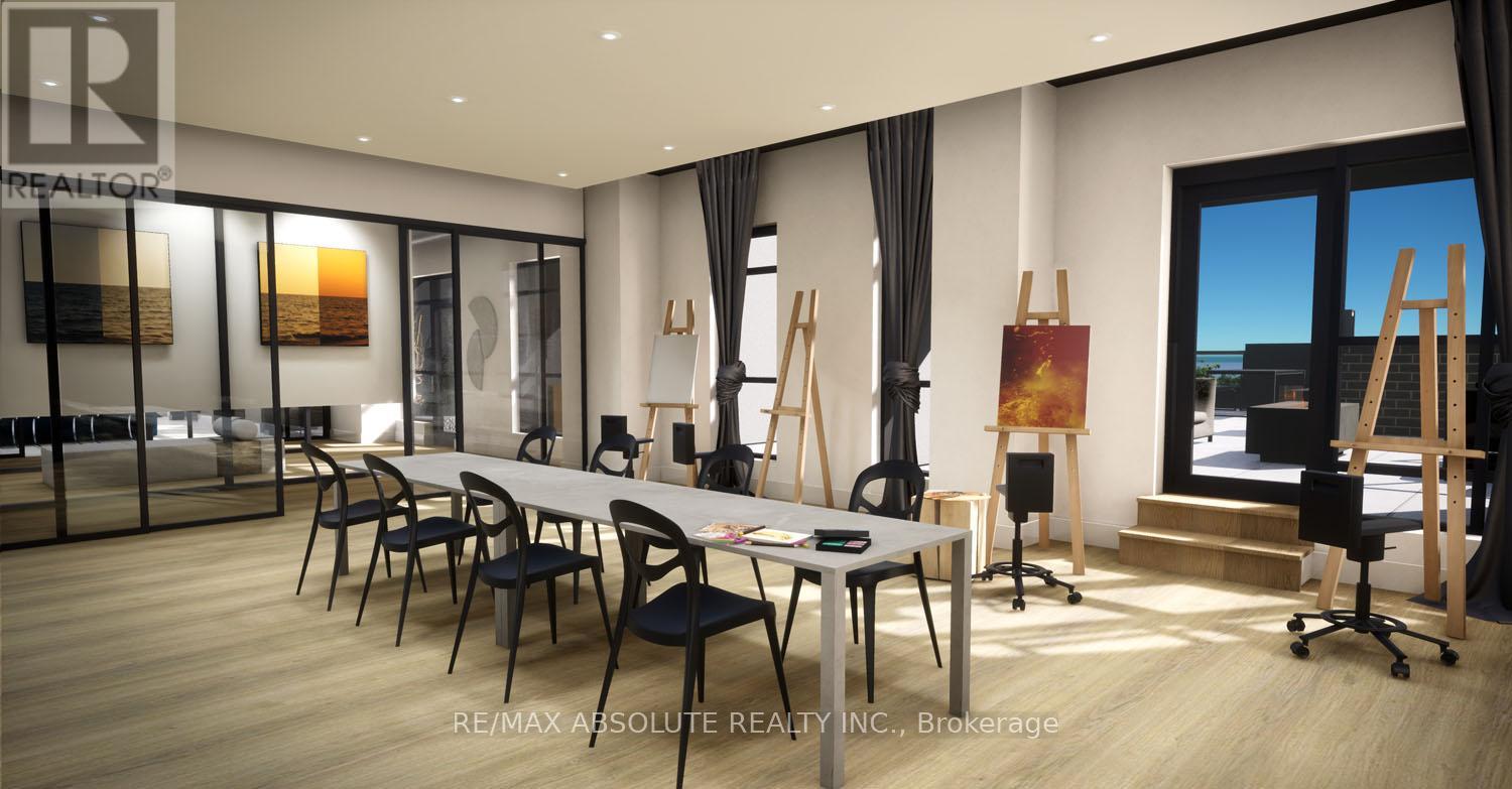 A modern office space with a long table and chairs.