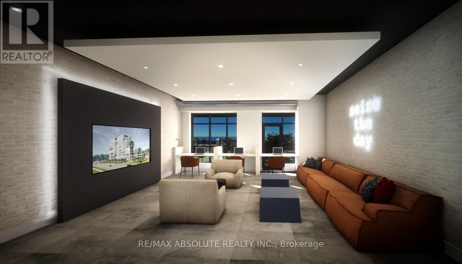 A modern living room with a large screen and comfortable seating.