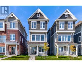 A row of houses with the brokerage logo in the bottom left corner.