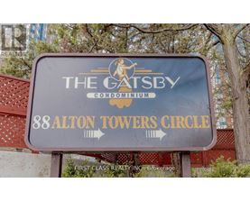 A sign for The Gatsby Condominium at 88 Alton Towers Circle.