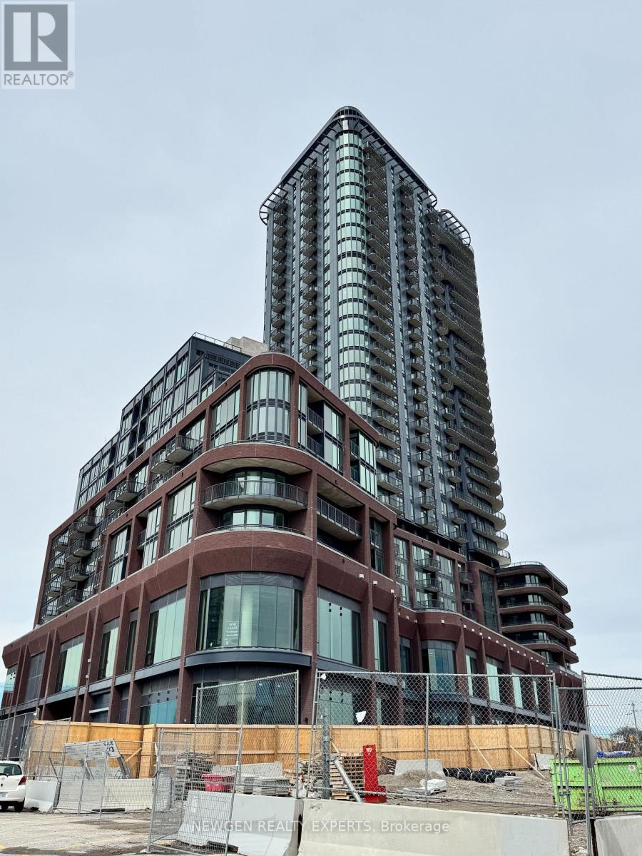 A large building under construction with a sign that says "New Hydro".