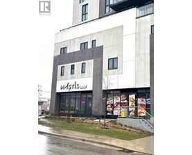 A building with a sign that says "MASTERS" on it.