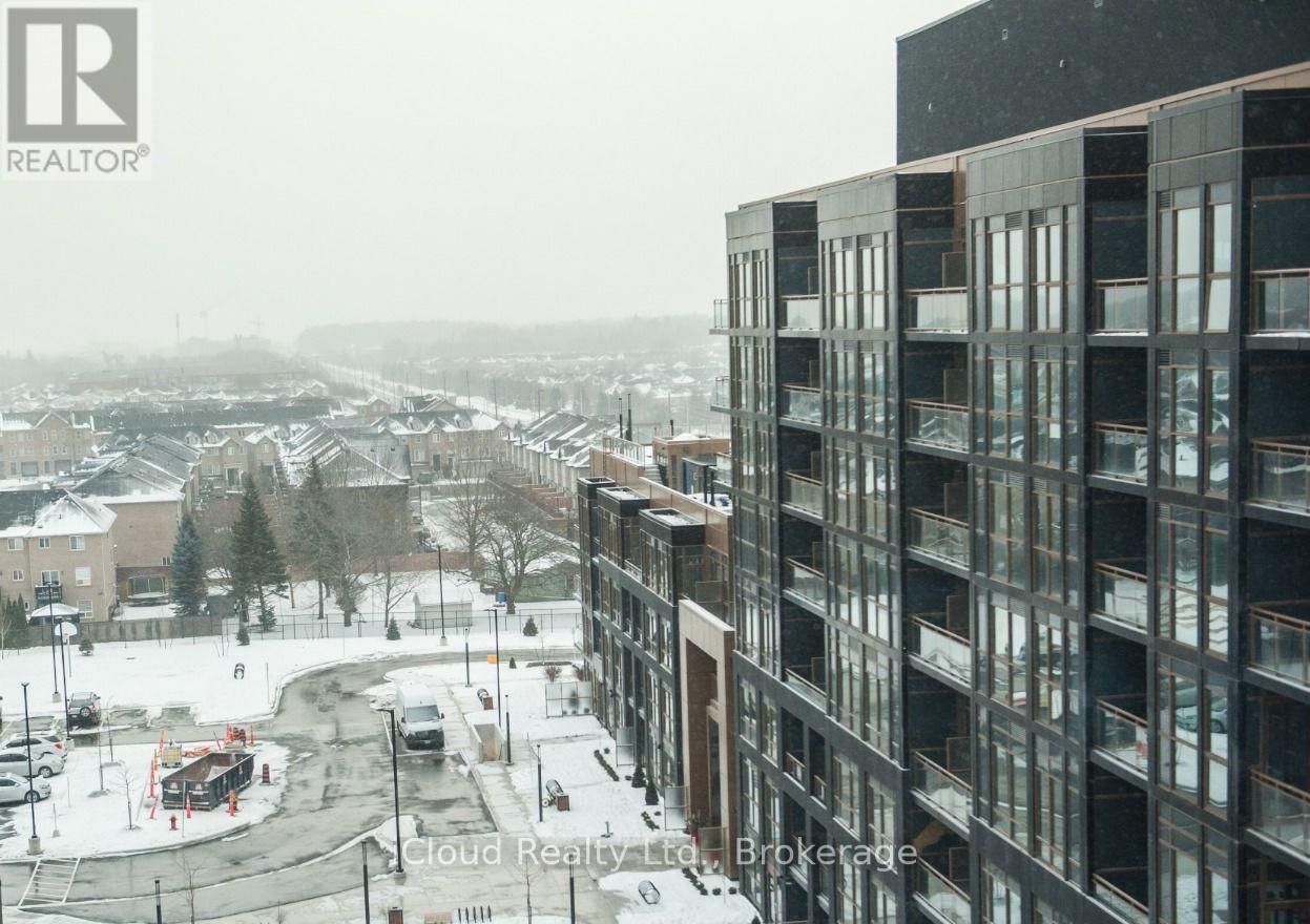 A view of a snowy landscape with a building on the right.