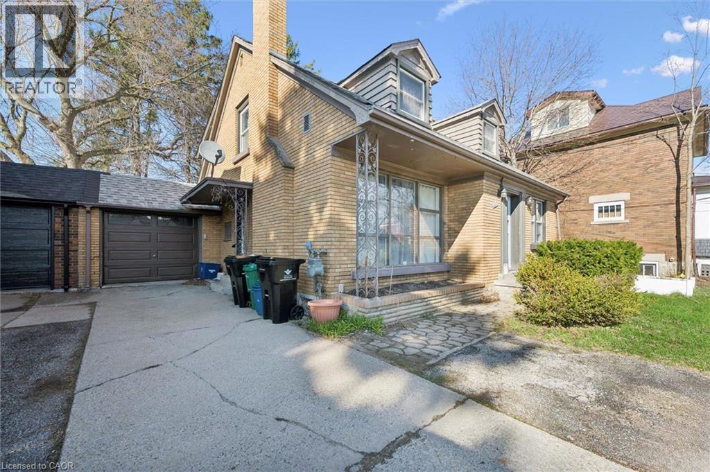 A house with a driveway and a garage.
