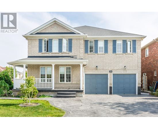 A house with a grey roof and blue garage doors.