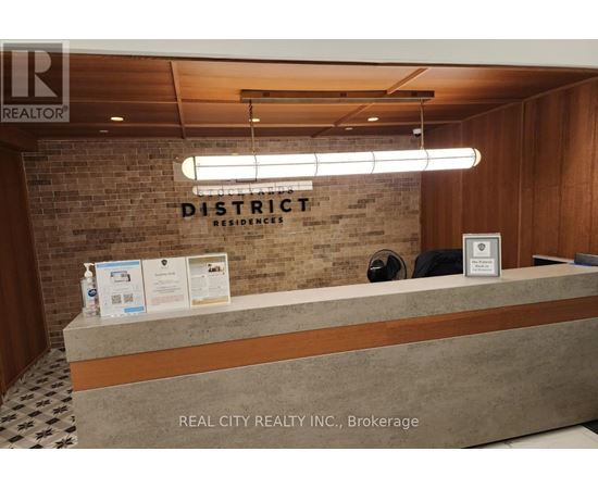 A reception desk with a sign that says "REALTOR" on it.
