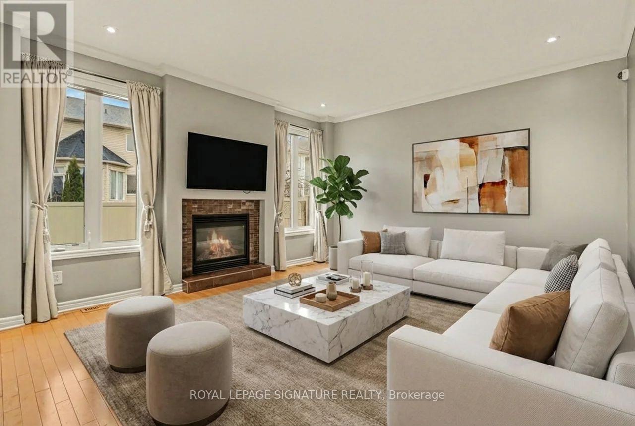A living room with a fireplace and a couch.