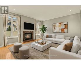 A living room with a fireplace and a couch.