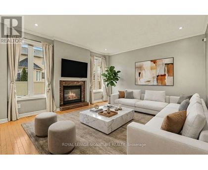 A living room with a fireplace and a couch.