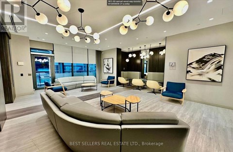 A modern living room with a large sofa and a coffee table.