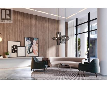 A modern living room with a sofa, armchairs, and a coffee table.