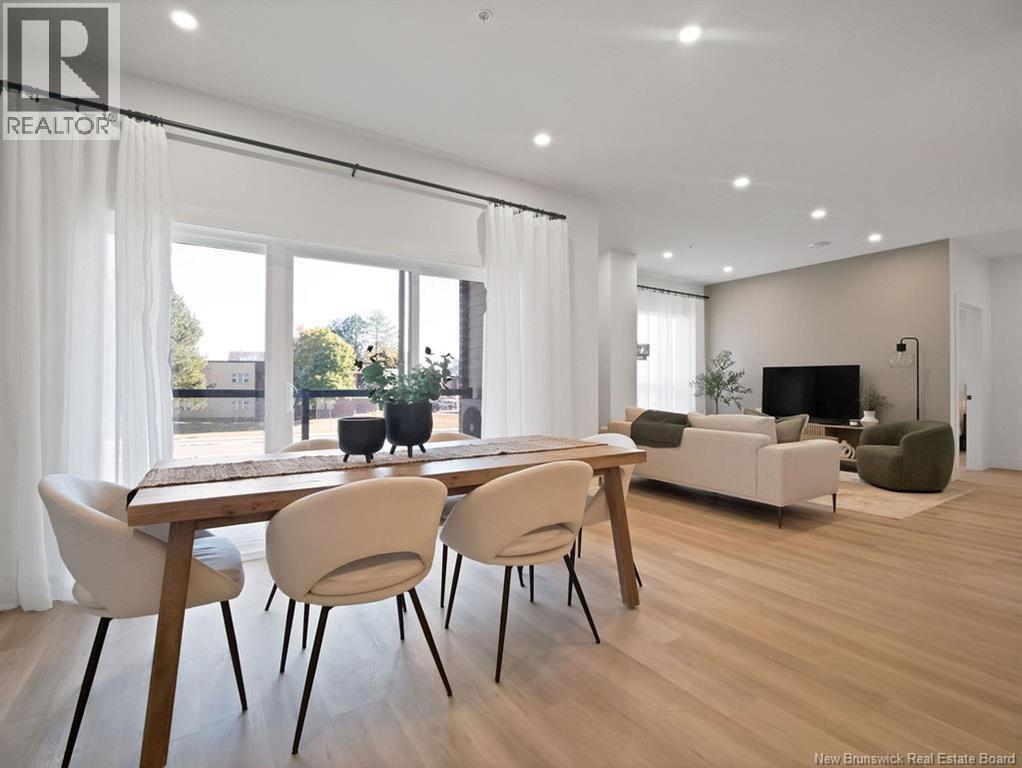 A modern dining room with a wooden table and chairs.