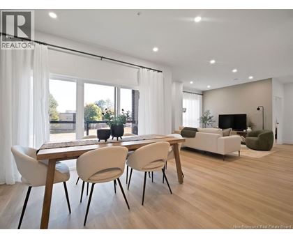 A modern dining room with a wooden table and chairs.