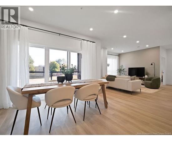 A modern dining room with a wooden table and chairs.
