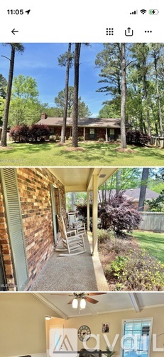 A house with a porch and a front yard.