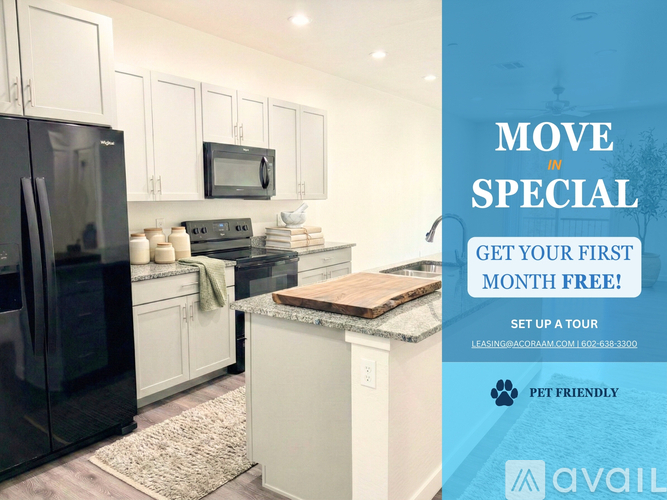 A kitchen with a black fridge and white cabinets is on offer for rent.