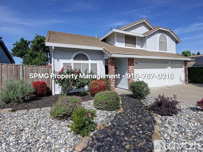 A house with the text SPMG Property Management on the front.