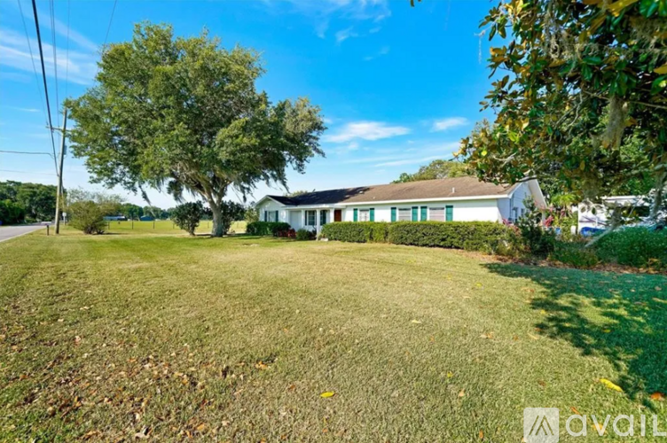 A house with a lawn in front of it.