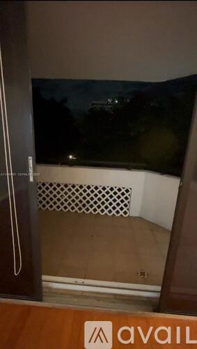 A balcony with a view of the night sky.