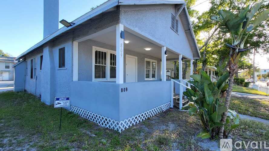 A house with a blue exterior is for sale.