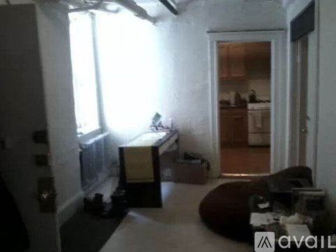 A room with a bed and a couch in it.