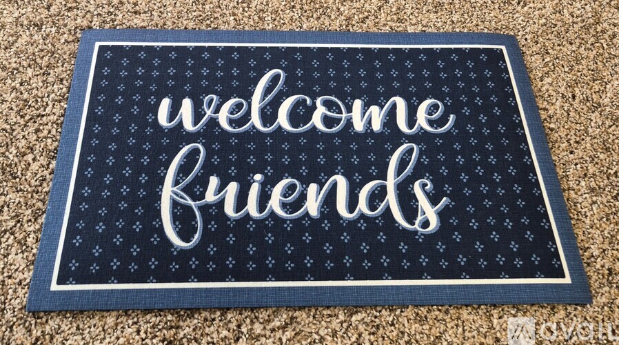 A doormat that says "welcome friends" on it.