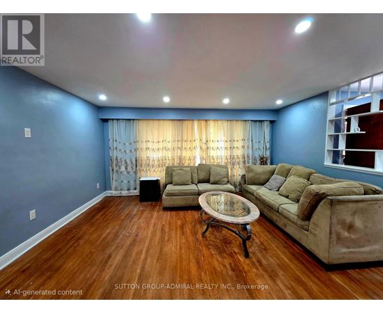 A living room with a brown sofa and a glass coffee table.