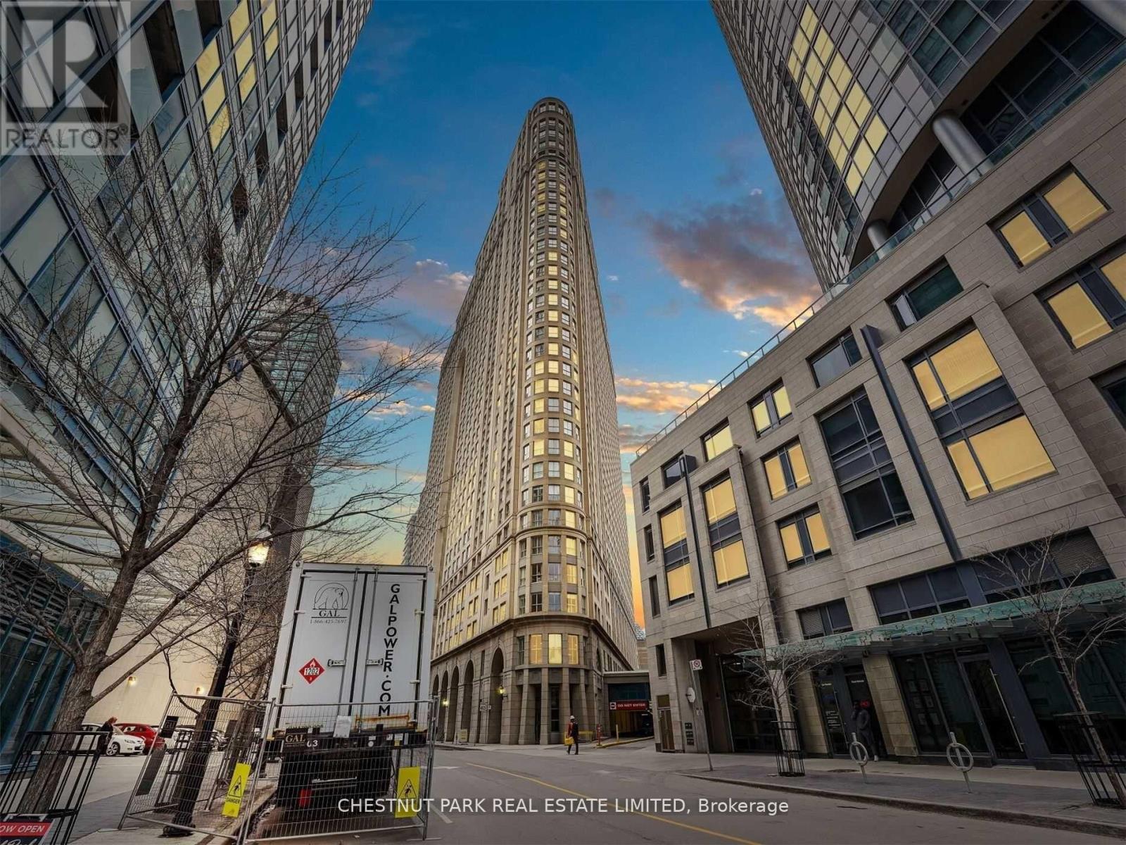 A tall building with the words Chestnut Park Real Estate Limited on the bottom.