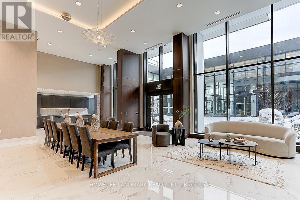 A large, modern dining room with a long table and chairs.