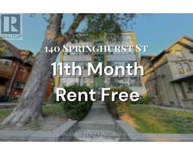A sign advertising a 11th month rent free offer from Landlord Realty Inc.