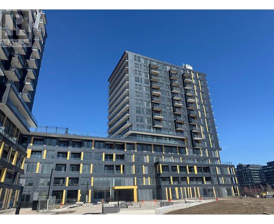 A large building under construction with a clear blue sky in the background.