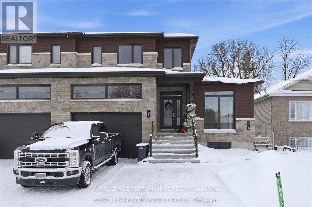 A large house with a truck parked in front.