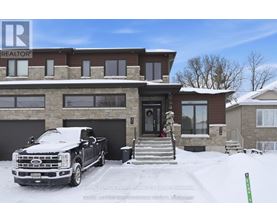 A large house with a truck parked in front.