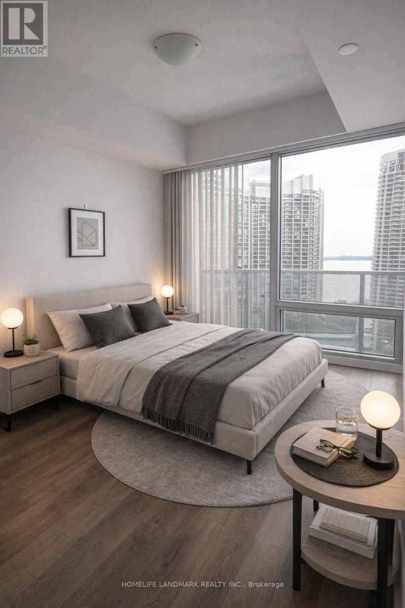A modern bedroom with a large bed and a view of the city.