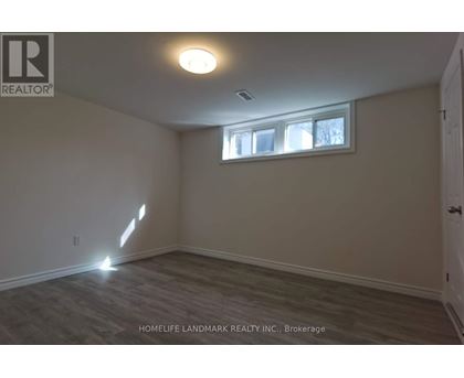 A room with a window and a door is shown.