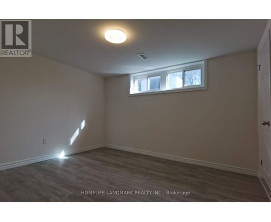 A room with a window and a door is shown.