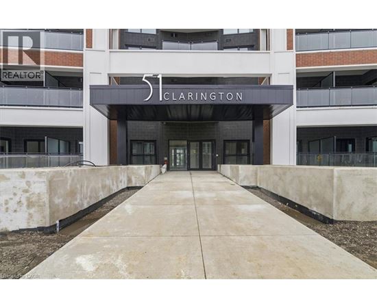 The entrance to a building with the number 51 and the word Clarington on it.